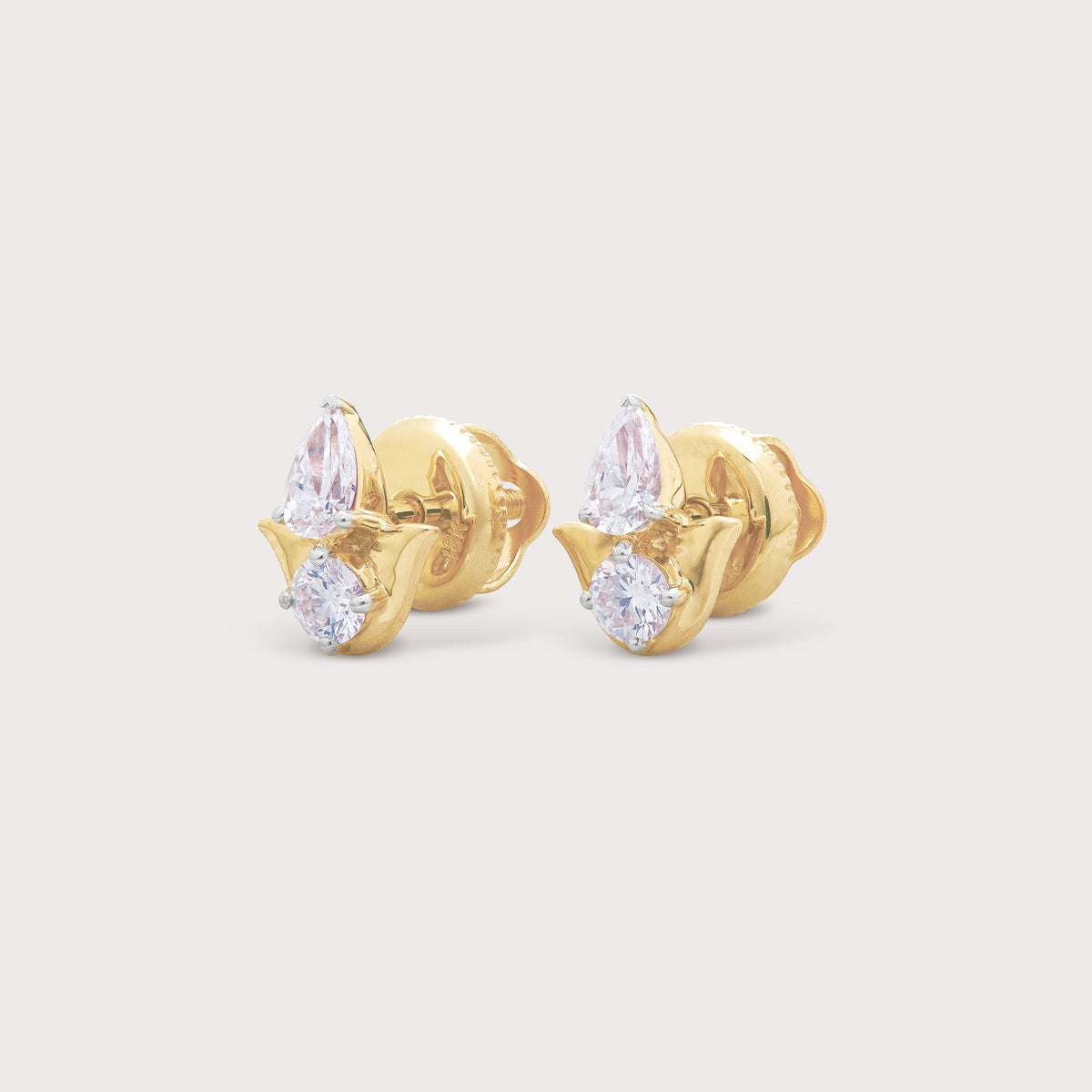 Pear & Round Diamond Studs